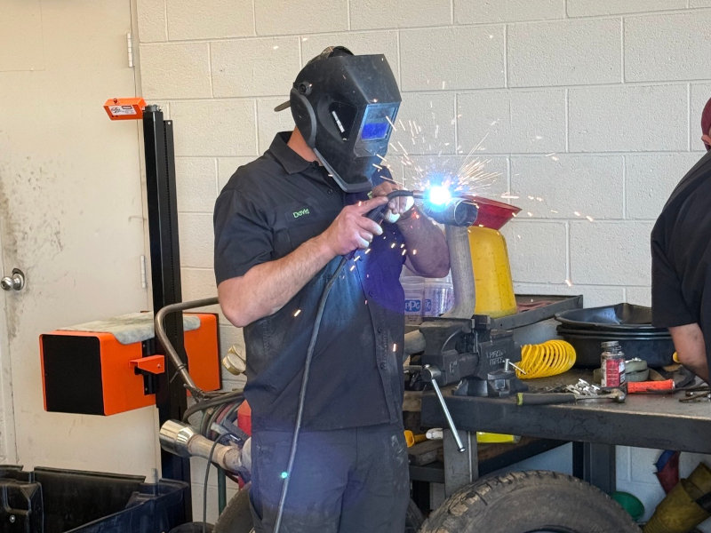 David welding in the shop